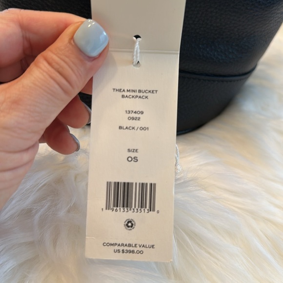 Like new Authentic Tory Burch Thea Mini Bucket Backpack in black. - Picture 5 of 16
